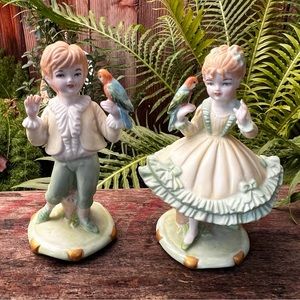 PMC Porcelain Boy & Girl Holding Parrots